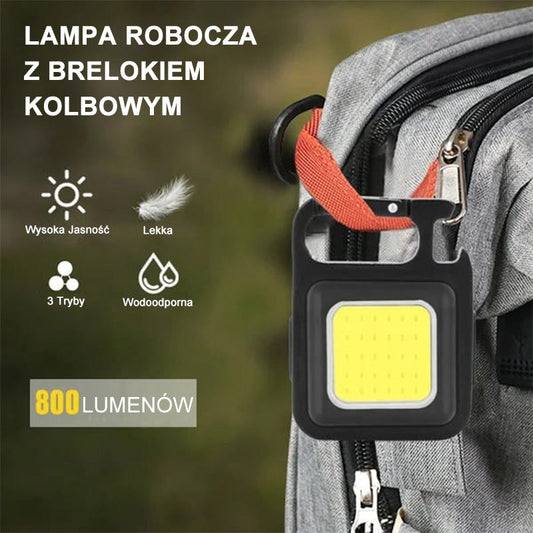 Przenośna miniaturowa lampa robocza CBO z kółkiem na klucze